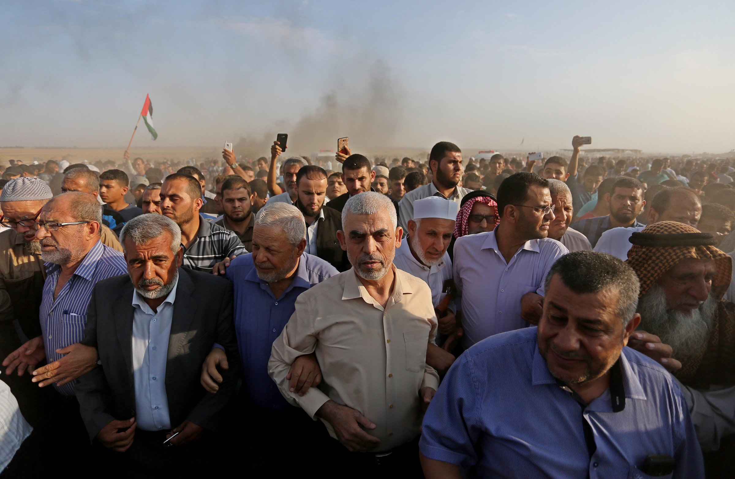 Sinwar, center, takes part in the "Great March of Return" demonstration near the Israel-Gaza border on Sept. 28, 2018.